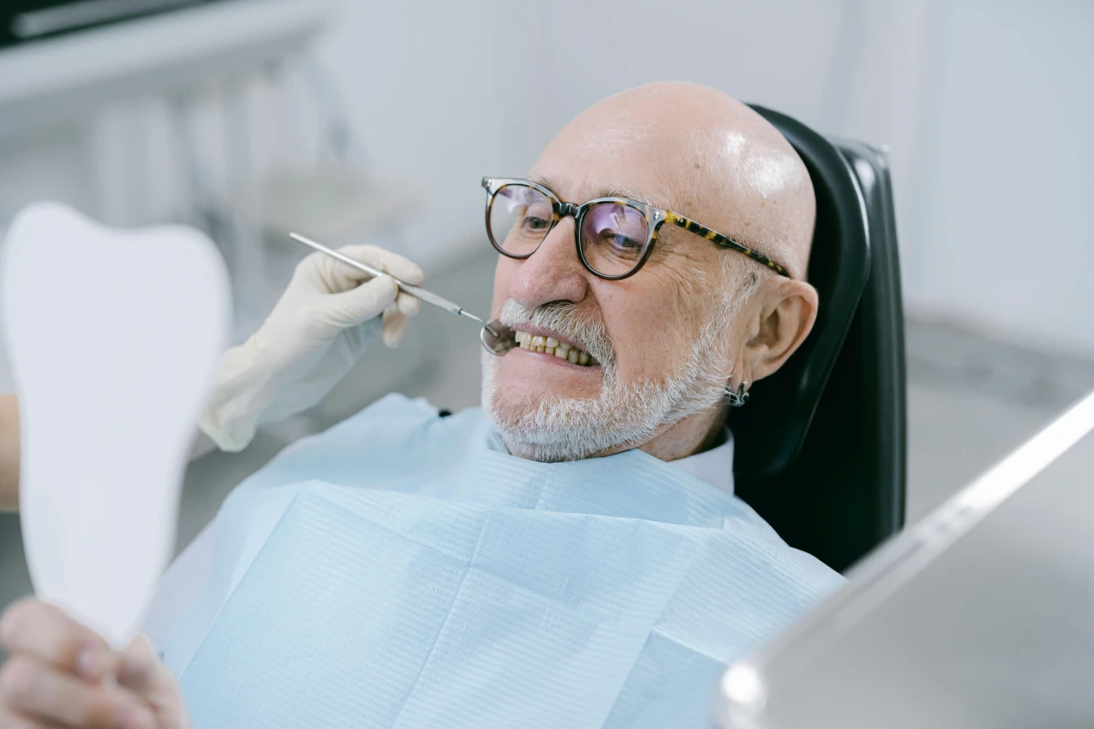 Patient getting teeth inspected